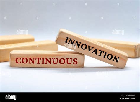 Continuous Innovation Text On Wooden Blocks Business Culture And