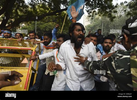 Demonstrators Scuffle With Police Officers During A Protest Organised