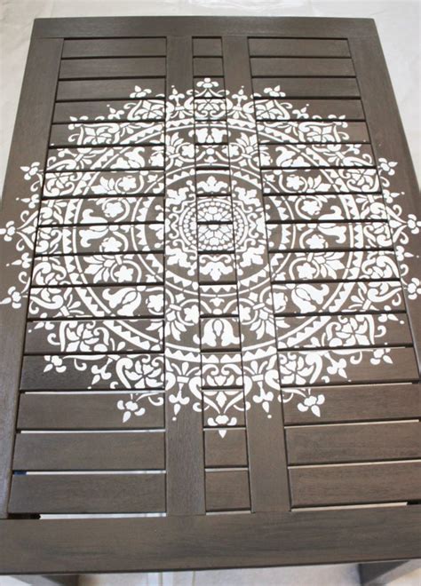 Stencil An Outdoor Table With A Mandala Pattern