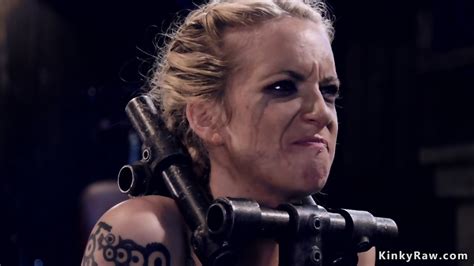 Shackled Blonde Slave Gets Whipped