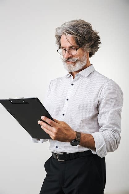 Premium Photo Portrait Of A Handsome Mature Businessman Dressed In Formal Wear Standing