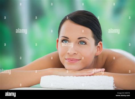 Beautiful Brunette Relaxing On Massage Table Smiling Stock Photo Alamy