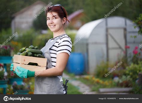 Smiling Brunette With Cucumber Crop Stock Photo By Logoff
