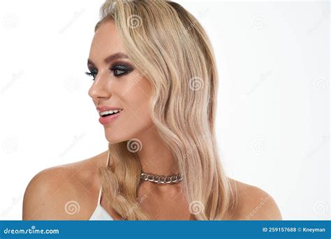 Portrait Of Blonde Woman With Smokey Eyes Make Up And Wavy Hairstyle Black Polish Nails Stock