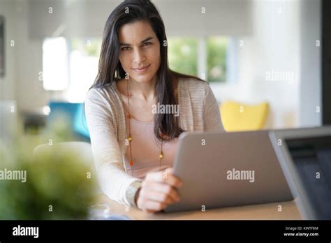 Portrait Of Brunette Girl Working On Laptop Computer Stock Photo Alamy