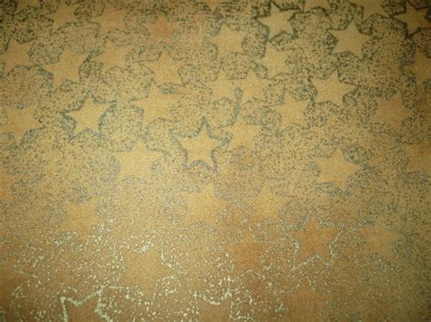 Gold Colored Cotton Quilting Fabric With Gold Stars Fat