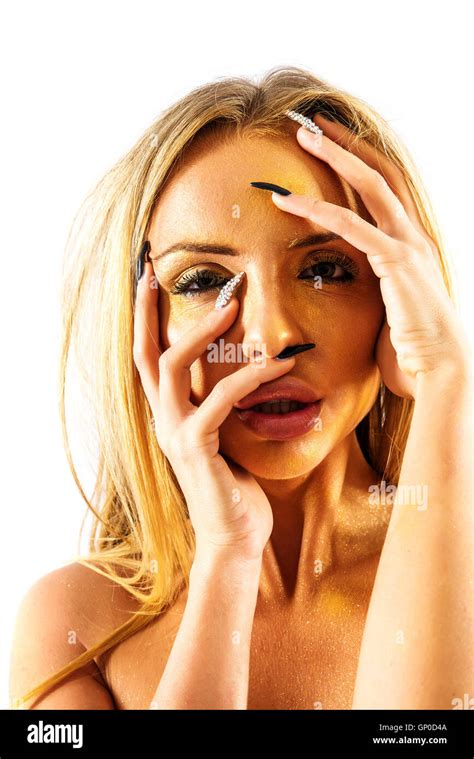 Fashion Portrait Of A Nude Woman Slightly Covered In Gold Dust Stock Photo Alamy
