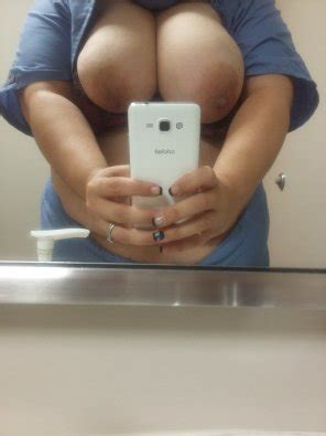 Nurse Was In The Bathroom When Her Tits Popped Out Porn Photo