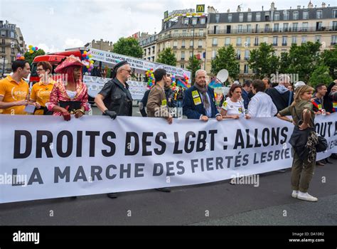 Paris France Crowd LGBT Groups Marching In Annual Gay Pride Protest Signs Protesters