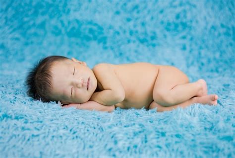 Premium Photo Newborn Baby Sleeping Peacefully Naked