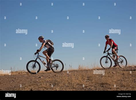 Golden Colorado Mountain Bike Riders On North Table Mountain A Mesa