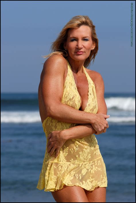 Muscular Blonde Peggy Vee Frees Her Fake Tits From A Yellow Dress At The Ocean Coedcherry