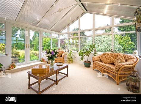 Large Conservatory With Wicker Furniture Stock Photo Alamy