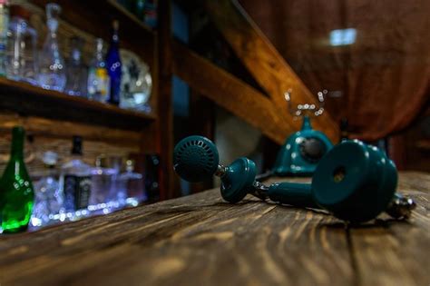Premium Photo A Green Disk Vintage Phone The Retro Telephone Handset