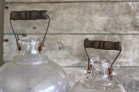 Primitive Old Glass Half And Gallon Bottles Moonshine Jug Jars W Wire Bail Wood Handles