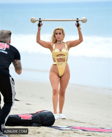 Marcela Iglesias Sexy Seen In A Golden Bikini During Beach Workout AZNude