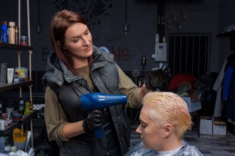 Cute Attractive Adult Brunette Girl Barbershop Worker Blow Drying Hair