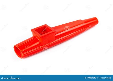 Red Kazoo Plastic Traditional Musical Instrument Object Isolated On