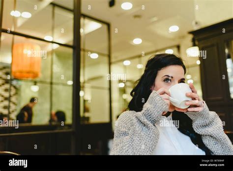 Pretty Brunette Woman Drinking Coffee In Vienna European City During A Trip Stock Photo Alamy