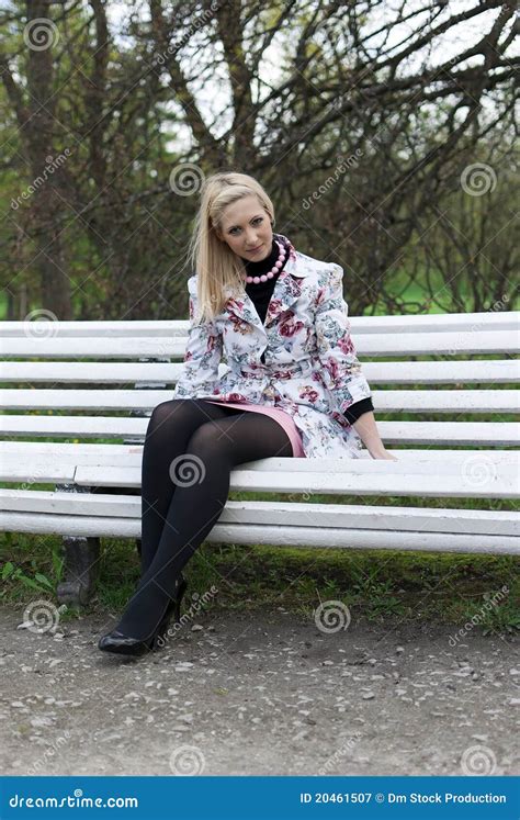 Blonde Girl Sitting On A Park Bench Stock Image Image Of Girl Park 20461507