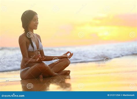 Relaxing Yoga Woman Meditating At Beach Sunset Stock Photo Image Of