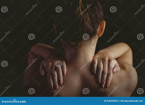 Nude Woman With A Shoulder Injury Stock Photo Image Of Sore Rubbing