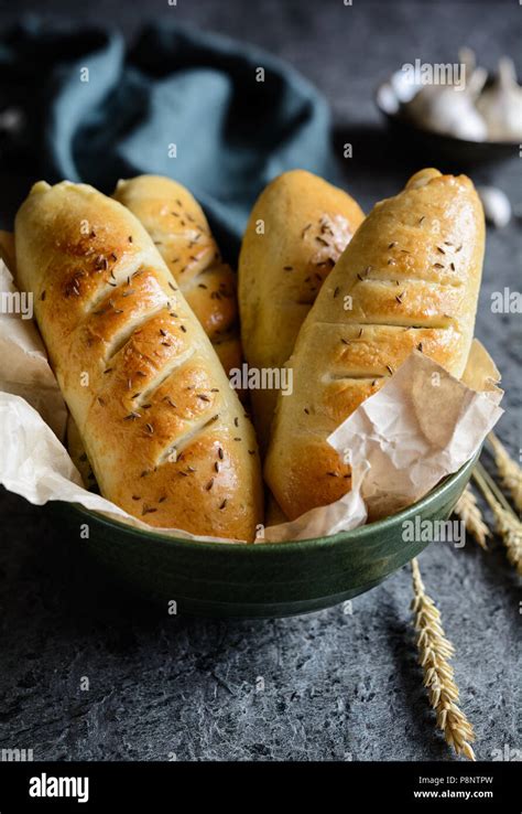 Homemade Garlic Baguettes With Parsley And Studded With Cumin Stock