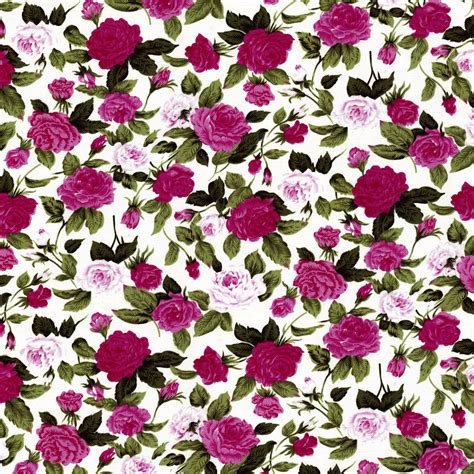 pink and red roses on white fabric with green leaves in the background, seamlessly