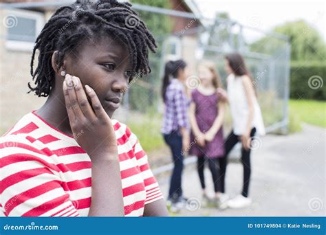 Sad Teenage Girl Feeling Left Out by Friends Stock Photo - Image of ...