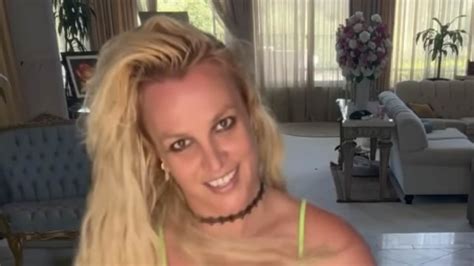 Britney Spears Wears A Neon Green Bikini With Knee High Boots In Latest