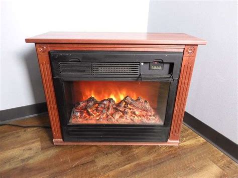 heat surge electric fireplace model adm   gc auctions