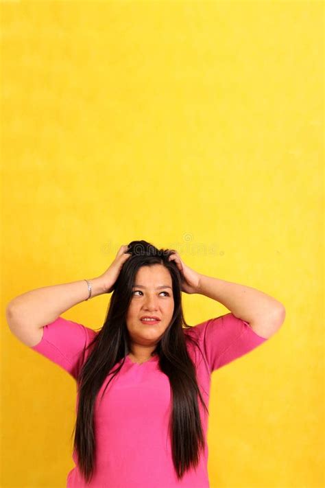 40 Year Old Latina Woman Sitting On The Floor Of An Empty House Looks Sad And Depressed Stock
