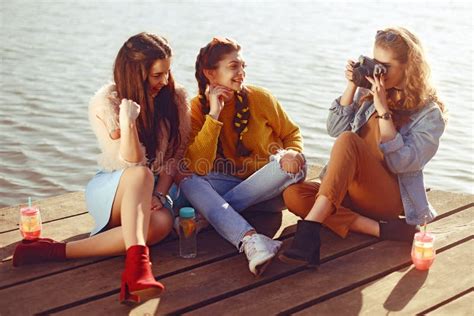 The Blonde Girl Takes Pictures Of Her Brunette Girlfriends On The Old Camera They Send Her
