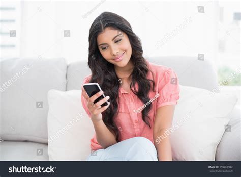 Smiling Cute Brunette Sitting On Couch Stock Photo 159764942 Shutterstock