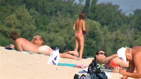 Nude Beach Girl Sunbathes Next To Her Man Outdoors Kobaltux