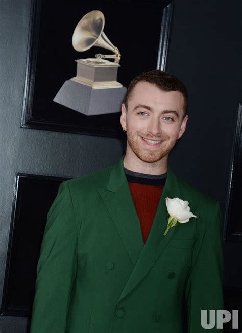 Photo: Sam Smith arrives at the 60th Annual Grammy Awards in New York ...