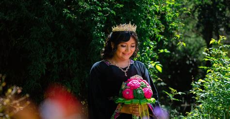 woman   black dress holding  bouquet  stock photo