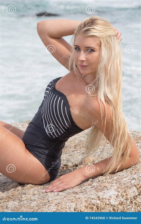 Beautiful Blonde Posing On The Beach Looking Stock Photo Image Of Person Lifestyle 74543968