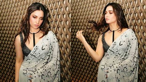 Milky Beauty Tamannaah Hot In Low Neck Sleeveless Saree Photos