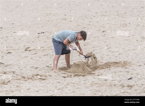 Boy Using Spade Hi Res Stock Photography And Images Alamy