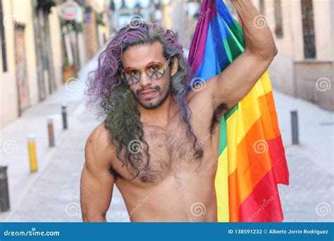 Gorgeous Gay Man Holding The Rainbow Flag Stock Photo Image Of Hispanic Hairy
