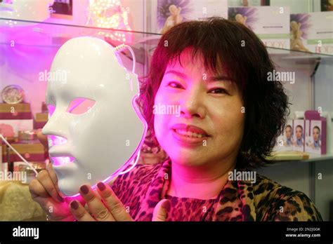 A model displays a spectrum mask made in Taiwan during the Taipei ...
