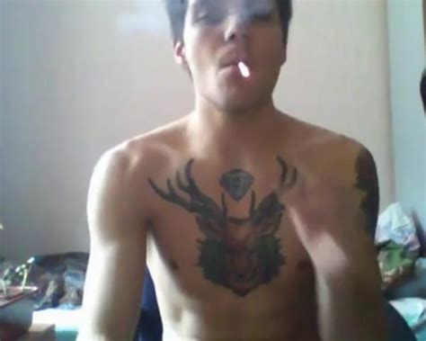 Tattooed Hot Guy Wanks Spunks And Smokes On Cam ThisVid