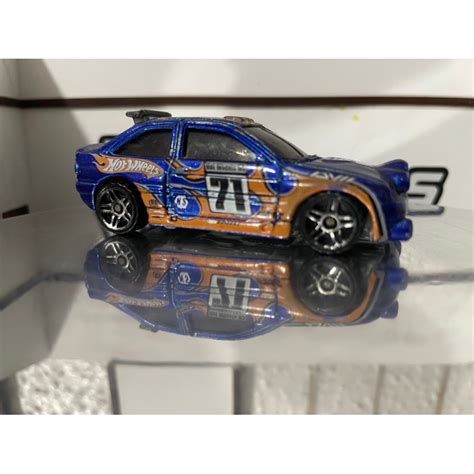 Hot Wheels Ford Escort Rally Loose Possui Marcas De Uso Shopee Brasil