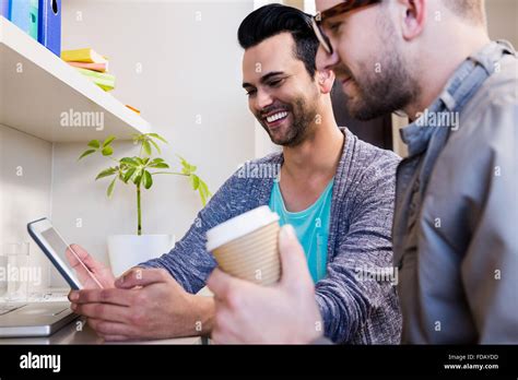 Happy Gay Couple Using Tablet Stock Photo Alamy