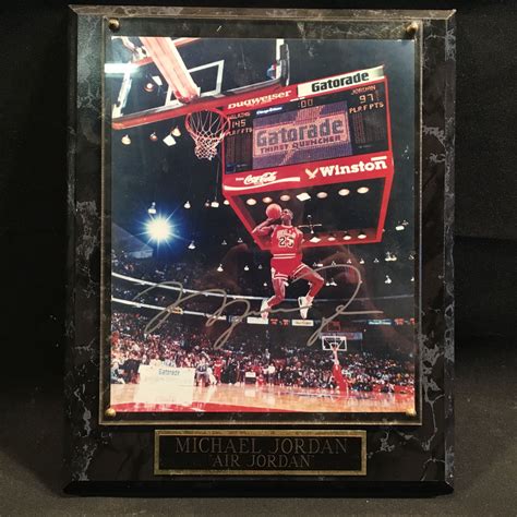 MICHAEL JORDAN AUTOGRAPHED "AIR JORDAN" PLAQUE WITH PICTURE, WITH