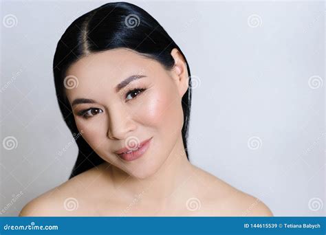 Beautiful Asian Woman Face With Clean Fresh Skin Nude Makeup Cosmetology Healthcare Beauty