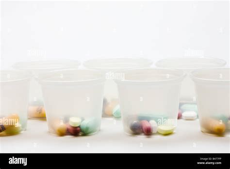 Tablets in containers Stock Photo - Alamy