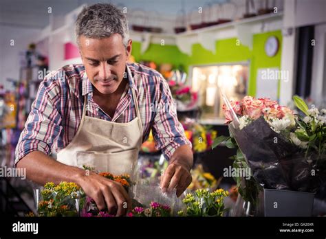 Male Florist Arranging Bouquet Of Flower Stock Photo Alamy