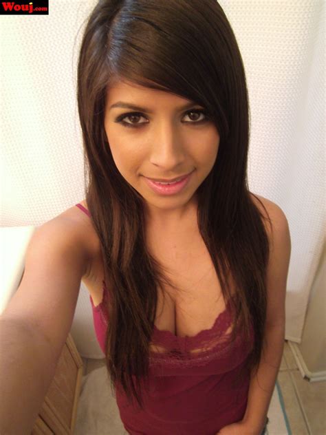 Good Looking Brunette Girl Teasing With Her Big Cleavage Photos